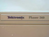 Tektronix Phaser 560 front nameplate badge closeup showing brand and model name