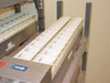 Top-down view of Stulz ENS-24U humidifier module showing row of white ultrasonic vibrator cups inside stainless tray