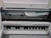 HP DeskJet 1220C interior view with top cover open showing print carriage rail and ribbon cable