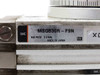 SMC MSQB30R-F9N label closeup showing model number, 0.6 MPa max pressure, and Made in Japan markings