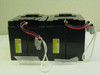 Four sealed lead-acid batteries with interconnect wiring harnesses – two pairs wired in series/parallel for 48V configuration