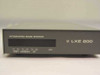 LXE 200 Integrated Base Station front panel — showing INTEGRATED BASE STATION label, TX/RX HOST, CONSOLE, RF indicator LEDs, RUN LED, and LXE 200 logo