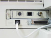 HP JetDirect card rear port close-up showing LocalTalk II DIN, 10Base-T RJ-45, BNC, and parallel Centronics connectors