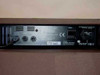 Laney EA120 bottom rear panel — Speakers output jack, mains power socket, CE mark, serial number label, supply voltage 230V rating plate, and fuse holder