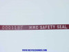 Close-up of a dark red MMC Safety Seal strap showing unique number 0001187 and 'MMC SAFETY SEAL' text embossed on the surface
