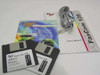 Focus 2 the Max FasCom 128 accessories laid out — User's Manual booklet, ISDN-U Drivers floppy disk (Windows 3.x/95/NT), FasCom 128 Diagnostics floppy disk (Windows 95), Multimedia Products Drivers CD, and ISDN telephone cable