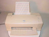 Epson Stylus Color 800 inkjet printer front view – cream housing, paper loaded in rear feed tray, output tray extended