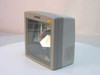 Symbol LS-5700-1000GN omni-directional mini-slot barcode scanner — front and right-side view showing scan window, mirror array, and speaker grille