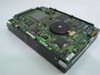 Compaq 127889-001 Fujitsu MAE3091LC hard drive PCB underside showing controller board and circuitry