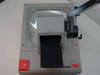 3M 905 Overhead Projector — top-down view showing fresnel lens stage, power switch (red), and 3M branding on front face