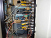 Bosch VS 18C rack interior – CTI Cryogenics controller unit (blue), solenoid valve bank, copper plumbing manifold, and interconnecting wiring