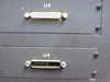 Close-up of Linotronic 300 rear interface connectors: LI 2 port (upper, 25-pin male parallel) and LI 5 port (lower, 25-pin male parallel)