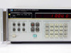 HP Hewlett-Packard 3325A Synthesizer Function Generator front panel with red LED display showing 100.0 and keypad controls