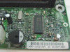 Intel AA A51507-804 motherboard close-up showing board label ABFV12822489, AA A51507-804 marking, Super I/O chip, and 14.318 MHz crystal oscillator