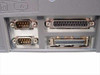 Close-up of Intel StorageExpress LDS240208E rear I/O panel showing Optional Token Ring Card slot label (TPE/AUI), two DB9 serial ports, DB37 connector, and 50-pin Centronics SCSI connector