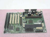 Intel 683503-305 AL440LX Slot 1 ATX motherboard — top-right angle showing AGP slot, DIMM slots, dual IDE connectors, capacitors, and chipset area