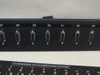 Close-up of rackmount panel showing numbered DB25 ports 87 through 93 with T-Screen to Computer Room label below