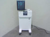 Sirona CEREC 2 dental CAD/CAM milling machine — full front view showing CRT monitor displaying circular milling graphic and milling unit on white mobile pedestal cart