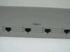 D-Link DES-2205 – front panel close-up showing four 10Base-T RJ-45 ports numbered 1 through 4 with per-port LEDs