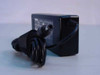 Toshiba PA3201U-1ACA AC adapter — rear view with coiled AC power cord and DC barrel tip connector visible