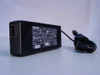 Toshiba PA3201U-1ACA 75W AC adapter — side and bottom view showing rating label and DC output barrel plug cable