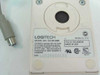 Logitech CA-93-6MD mouse — bottom label showing model number, Made in USA, 5V 10mA rating, FCC ID DZL6QBCM, and serial number LU529000152