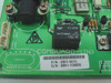 Com-Guard 2301-0010 PCB close-up showing part number label, serial number, COMGUARD-(IN) silkscreen, relay, and EMIC(B) marking