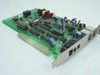 Kyungki Systems Com-Guard 2301-0010 ISA sensor card — angled top view showing green PCB with ICs, relay, and bracket-mounted ports