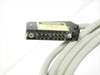 Pfeiffer PM 011 232-X cable — close-up of the D-sub multi-pin connector end with yellow caution label attached