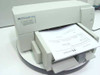 HP DeskJet 660Cse inkjet printer front view with paper tray extended and printed page loaded, showing HP and Meyers Laser Printer Service label on front