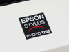 Epson Stylus Photo 1200 model badge close-up on white housing