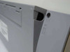 Sun Microsystems Type 5 Keyboard — rear left corner closeup showing Mini-DIN 8-pin connector port and tilt-leg slot