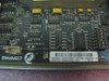 Compaq 299308-001 system board PCB close-up – rear label showing part number SPX299309, Assembled in USA marking, and Compaq logo