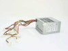 SPI FSP235-61GT 235W ATX switching power supply – three-quarter front view showing unit body and attached cable harness with Molex and Berg connectors