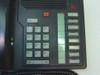 Nortel M2008 keypad close-up showing 12-key dialpad, Hold button, red message lamp, and 8 programmable line keys labeled Forward, Message, Conference, Transfer