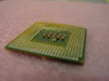 Intel Mobile Celeron SL642 – angled side view showing gold pin array and PCB edge