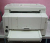 Ricoh 3500L fax machine H511-20 — rear view showing power inlet on left side and lower paper cassette drawer pulled open