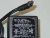 AK II Technology power supply model A10D2-09MP label showing 100–240V AC input and 9V 1.1A DC output specifications