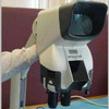 Vision Engineering Mantis stereo microscope on stand, front-left three-quarter view showing large eyepieceless viewing hood and MANTIS nameplate