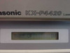 Panasonic KX-P4420 – LCD display showing WARM UP message during power-on sequence
