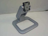 HP P9620A silver gray plastic monitor stand – front three-quarter view showing VESA mount bracket and base