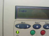 Lexmark Optra S 1650 front panel close-up showing LCD display reading 'Busy', Menu/Select/Return buttons, and green/red indicator lights