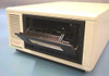 Exabyte EXB-8200SXST 8mm tape drive – front view with tape bay door open revealing cartridge loading mechanism and eject lever