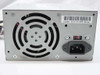 Dell HP-233SNF ATX power supply — opposite rear side showing fan grille, IEC C14 inlet, and DL233BNF REV H02 sticker
