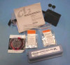 Hach CN-66 Free and Total Chlorine Test Kit contents spread out — carrying case, instruction booklet, color comparator wheel, reagent packets, and sample tubes