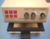 Bio-Tek Instruments EL402 Automated Microplate Washer — close-up of front panel showing red function buttons (Wash, Prime, Rinse, Stop/Ready, Aspirate, Dispense) and three rotary knobs for Cycles, Delay, and Fill Volume