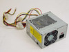 Delta Electronics DPS-200PB-71 200W ATX power supply – front-angle view showing 20-pin ATX connector, Molex and floppy harness, IEC inlet, and 80mm rear fan