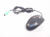 Compaq Logitech M-S69 PS/2 three-button mouse front view showing dark gray body with Compaq logo and green PS/2 connector