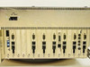 Rear card slot panel showing 16 numbered ISA slot positions with DB-9 serial connectors and RJ-style ports across all positions
