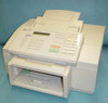 HP OfficeJet 330 C4661A all-in-one inkjet printer fax copier — front view showing LCD display, numeric keypad, function buttons, document feeder, and open paper output tray